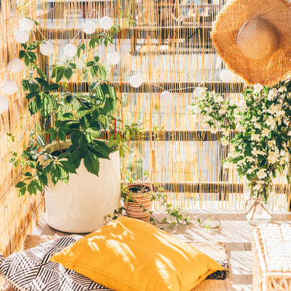 Create a Tropical Oasis for Summer Staycations With This Guide